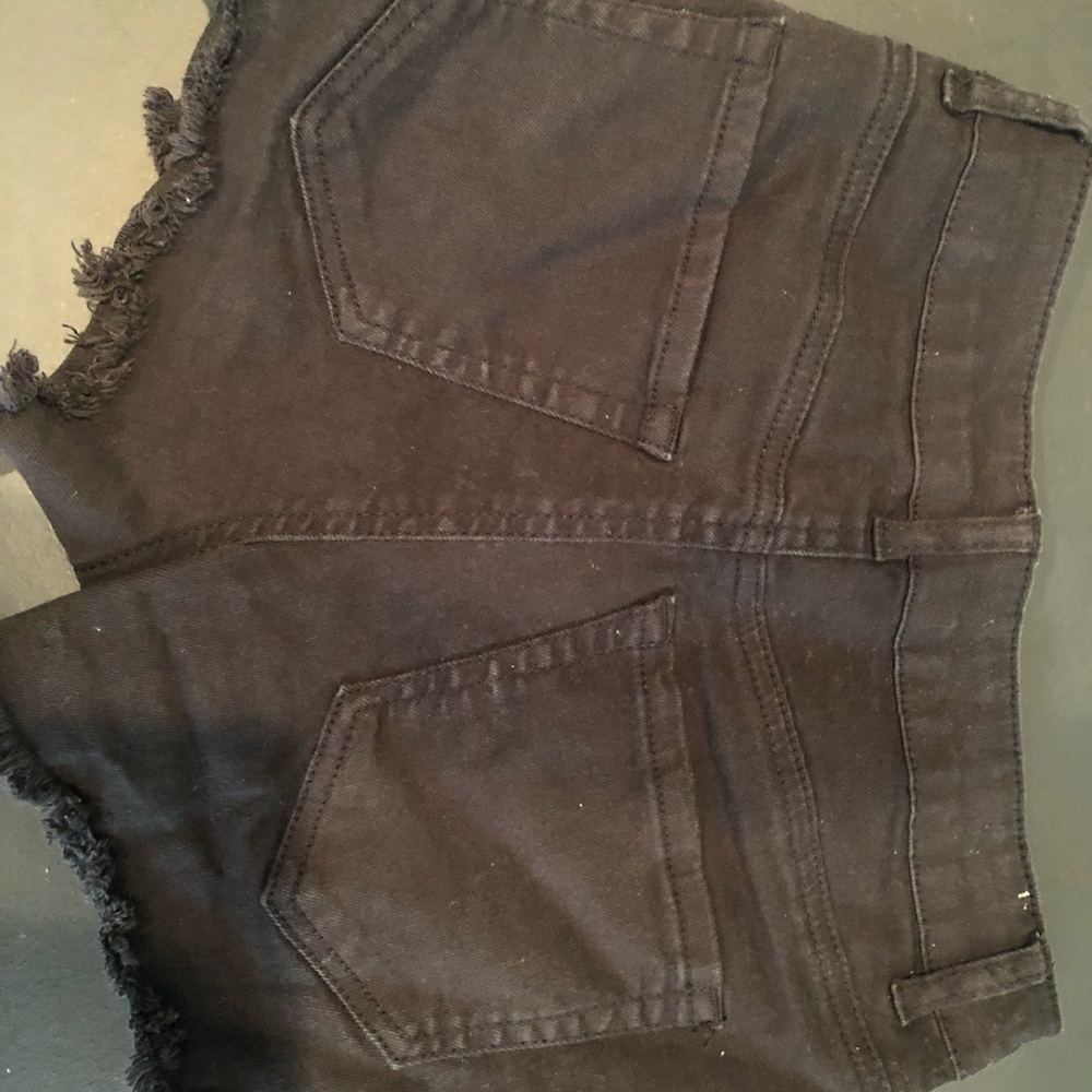 Black Jean shorts.